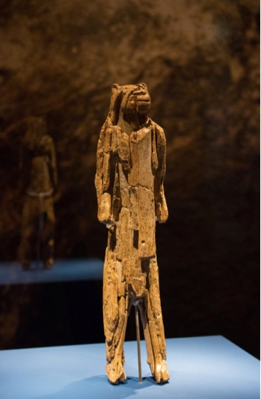 Ivory figure with lion head and partly human body standing upright, Stadel Cave, Baden-Württemberg, Germany, 40,000 years old (Museum Ulm)
