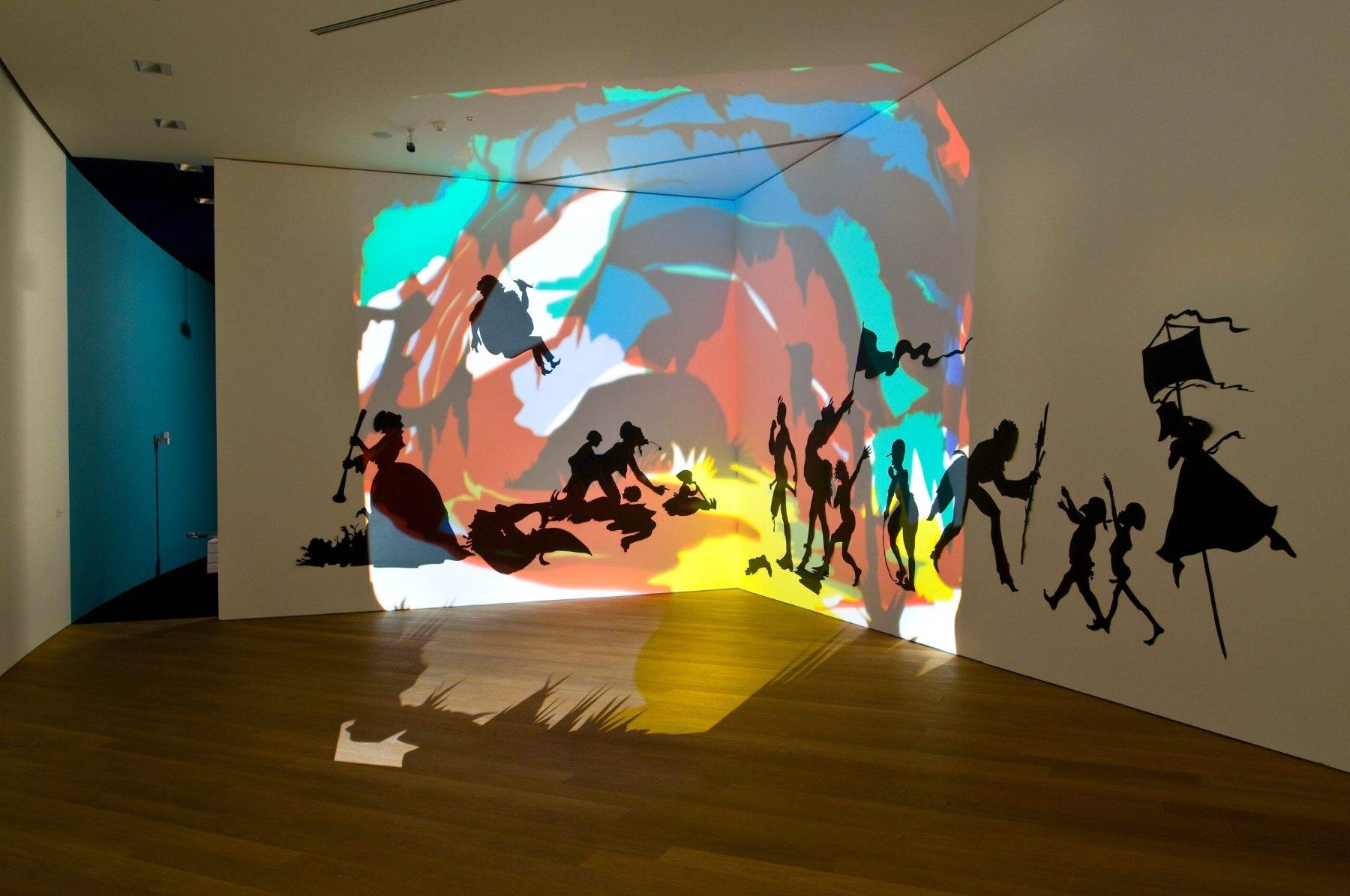 Darkytown Rebellion 2001 by Kara Walker, Cut paper & projection 4.3x11.3m