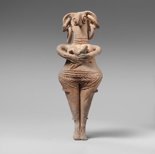 Terracotta statuette of woman with bird face, made by the Cypriot culture in the late Cypriot 2 period, ca. 1450-1200 B.C.