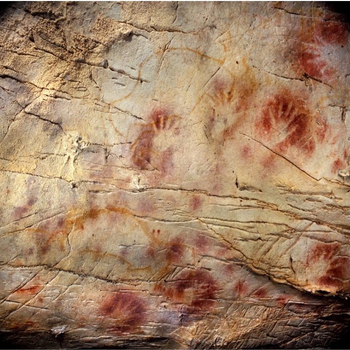 Title: Panel of Hands (Cave of El Castillo) Artist: Unknown, Year: c. 37,300+ years ago (for hand stencils),Medium: Red ochre, charcoal, and mineral p