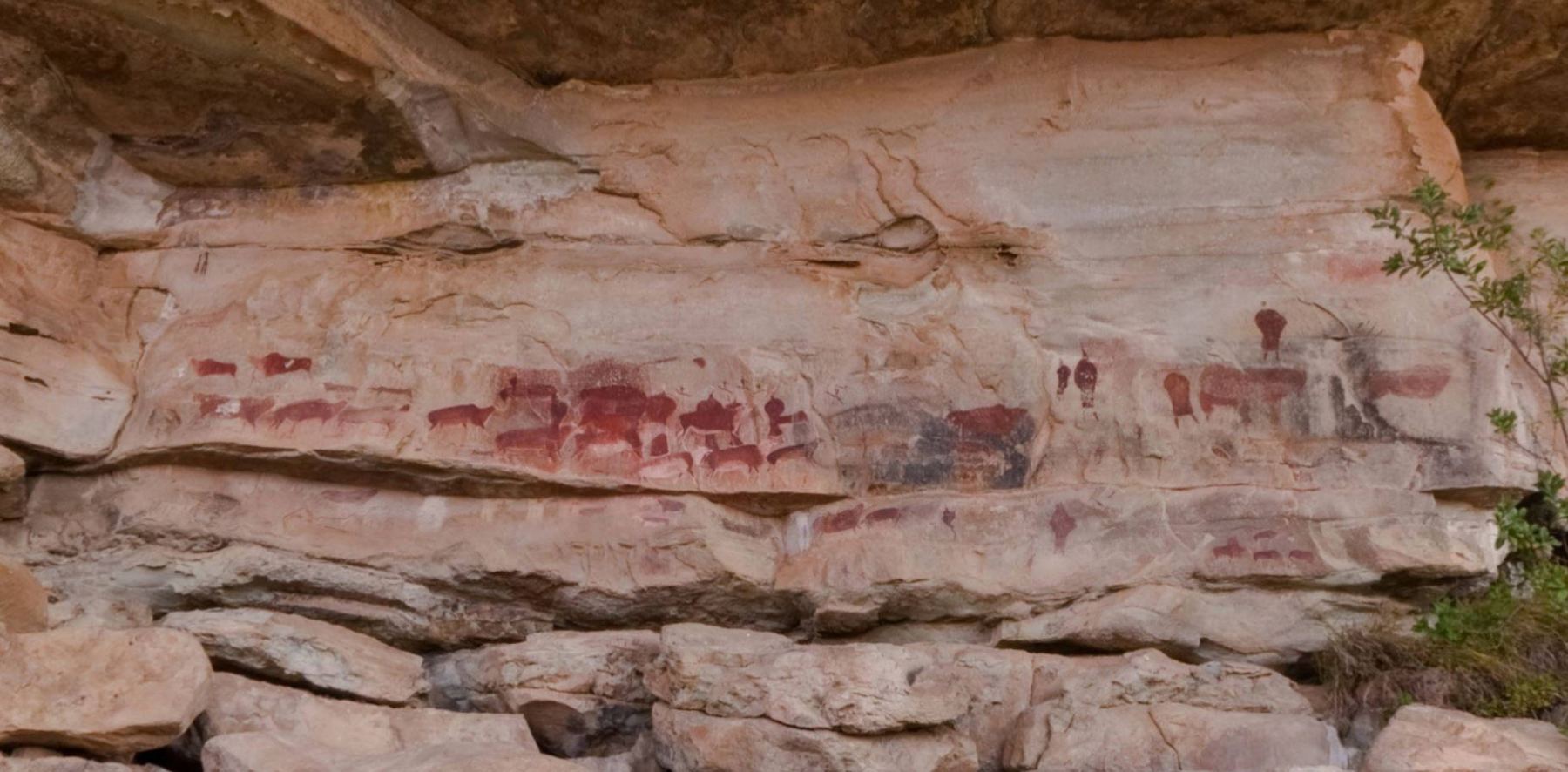 Title: Game Pass Shelter Drakensberg, The "Rosetta Stone" Panel  Artist: unknown Year: 500 BC to 1000 AD Medium: Rock painting using natural earth pig